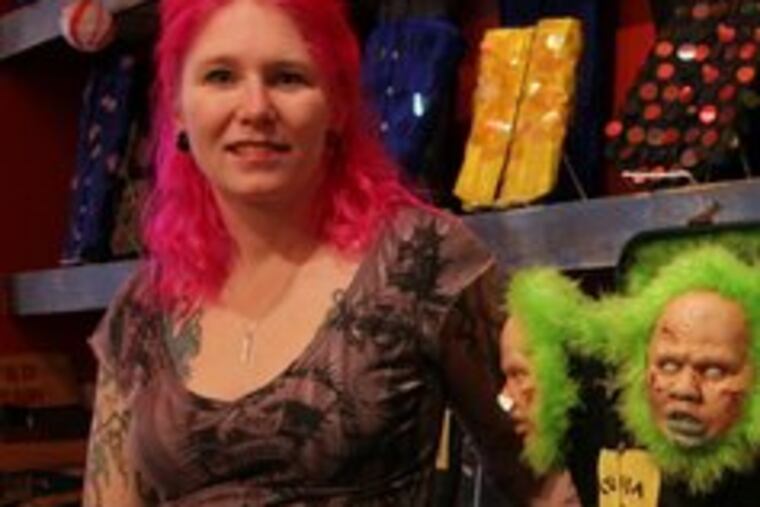 Amy McConnell of Delicious Corsets thought up "Corsets for a Cure," and her shop donated the garments to be decorated.