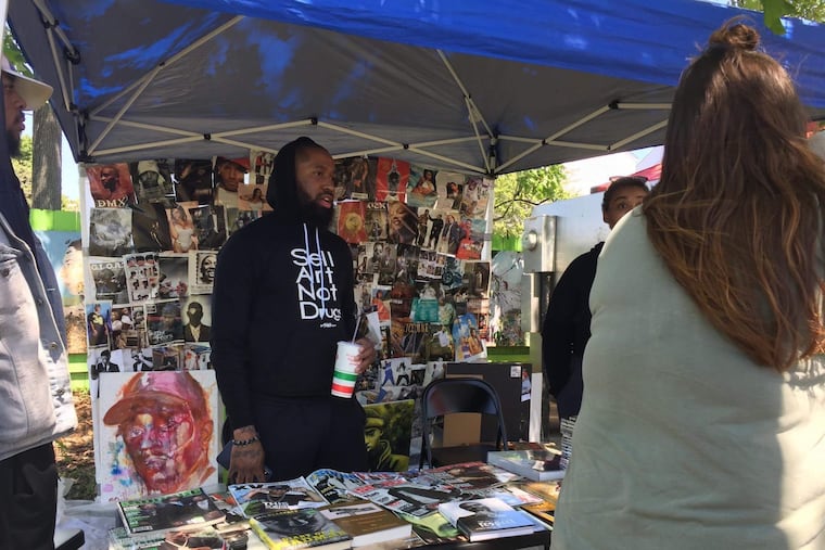 Mark S. Clarke, also known as Milly Vanderwood, at his Mini Hip-Hop Museum Pop-Up. He's bringing the museum to the 2026 Roots Picnic.