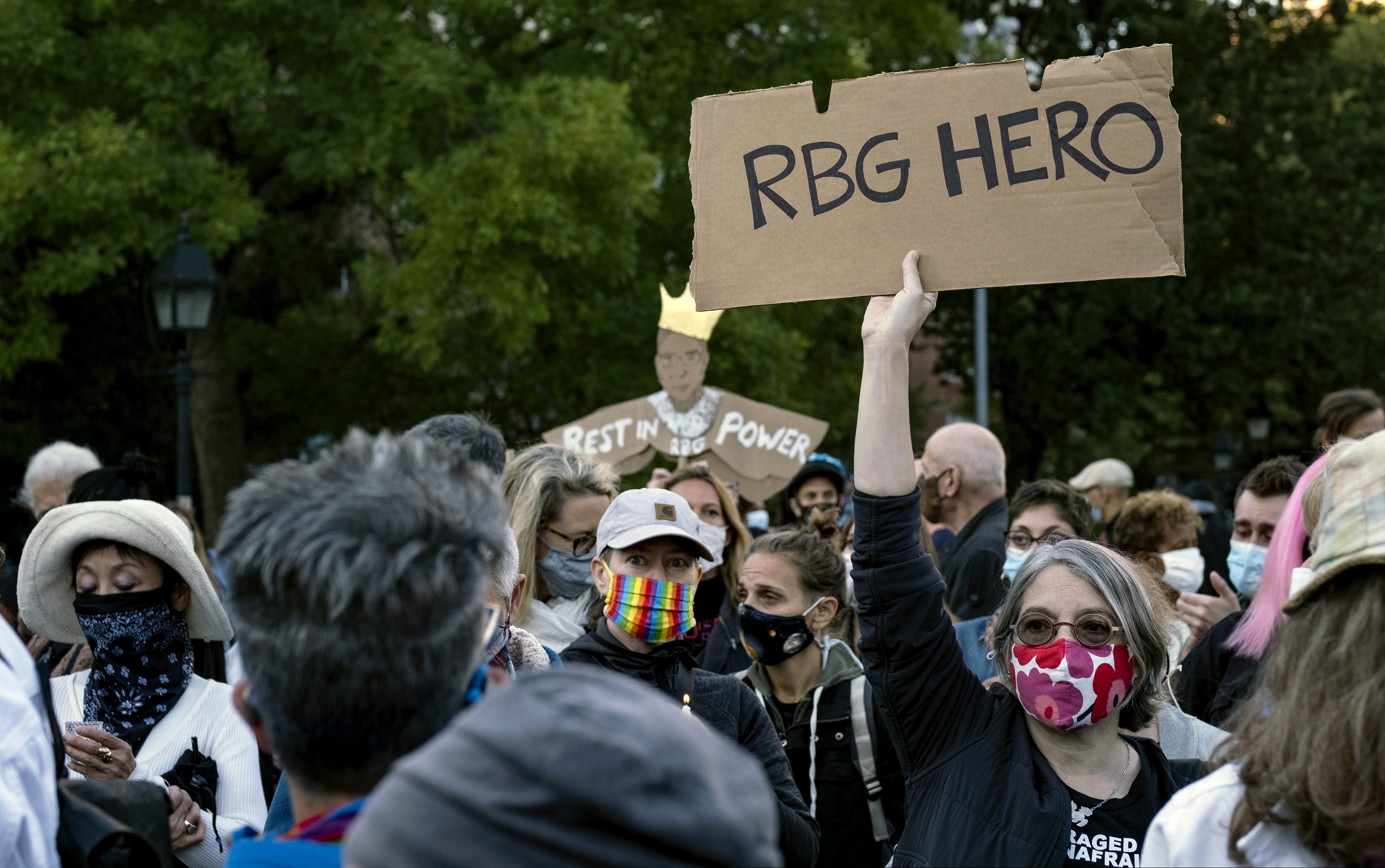 People gather at Washington Square Park in New York Saturday, a day after the death of Justice Ruth Bader Ginsburg.