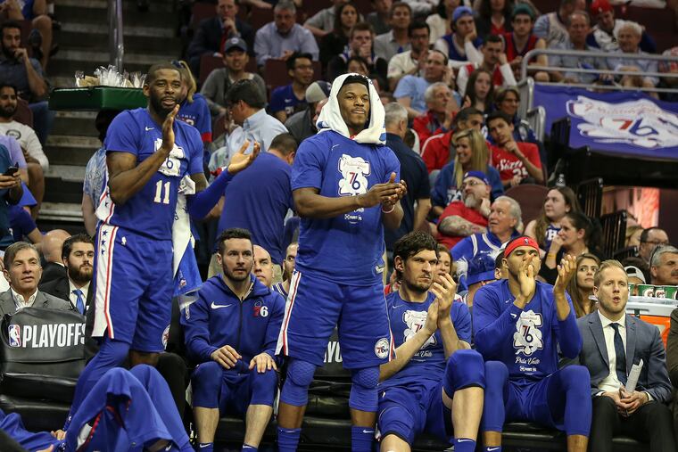 Sixers' bench cheers their team against the Nets during the 4th quarter of Game 5 of the first round of the NBA playoffs at the Wells Fargo Center in Philadelphia, Tuesday, April 23, 2019. Sixers beat the Nets 122-100 to win the first round of the playoffs (4-1).