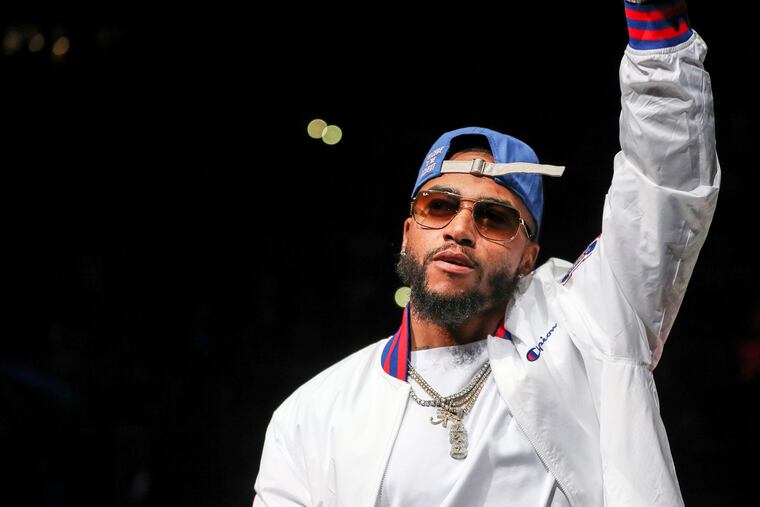 Eagles player DeSean Jackson rings the bell before the Sixers game against the Sacramento Kings at the Wells Fargo Center in Philadelphia on Friday, March 15, 2019.