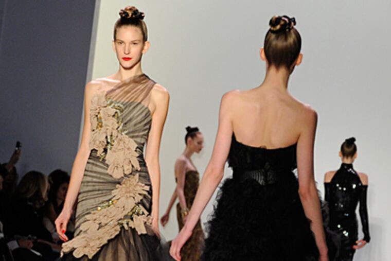 This Feb. 15 file photo shows the Monique Lhuillier fall 2010 collection modeled during Fashion Week in New York. In the fashion world, the word "nude" is most often used to describe a shade that is a little darker than champagne, lighter than sand and perhaps with a hint of blush or peach. (AP Photo/ Louis Lanzano, FILE)