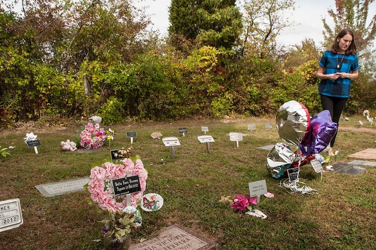 Ashley Sirianni and her husband, Ian, lost two babies to congenital heart problems, and both are buried in the Angel Garden in Sellersville. The Siriannis now help with administrative duties for the plot. ( Matthew Hall / Staff Photographer )