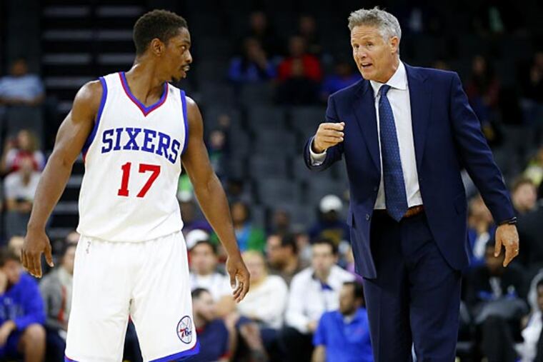 Philadelphia 76ers’ Casper Ware (17) listens to head coach Brett Brown
during the second half of an NBA pre-season basketball game in Allentown, Pa., Saturday, Oct. 18, 2012. The 76ers defeated the Magic
95-84. (Rich Schultz/AP)