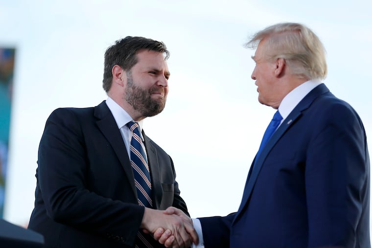 Senate candidate JD Vance, left, greets former President Donald Trump at a rally at the Delaware County Fairgrounds, Saturday, April 23, 2022, in Delaware, Ohio, to endorse Republican candidates ahead of the Ohio primary on May 3.