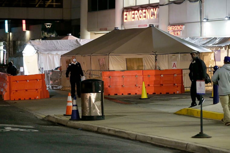 In April, almost every Philadelphia hospital set up portable medical tents to help screen and test the flood of coronavirus patients. These tents were outside the Hospital of the University of Pennsylvania (HUP) emergency room. Area hospitals are now largely back to normal, but are seeing an uptick in admissions for COVID-19. (Elizabeth Robertson/The Philadelphia Inquirer/TNS)
