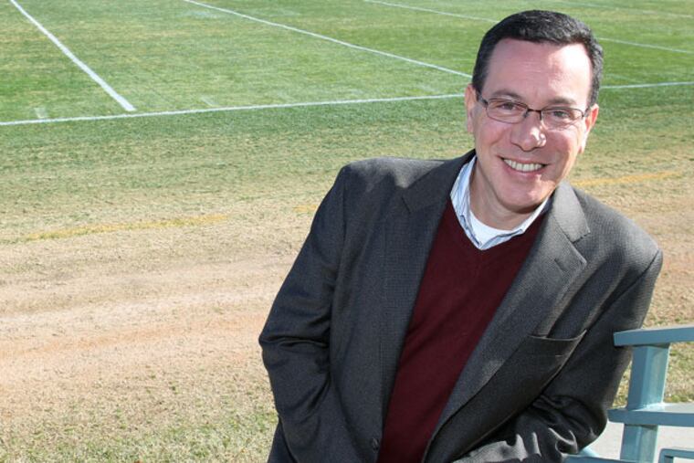 Eagles announcer Scott Graham poses at the NovaCare Complex. (David Maialetti/Staff Photographer)