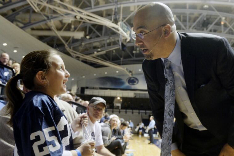 James Franklin greets Sofia Peters, 7, during the event to mark the school's signing day. (AP)