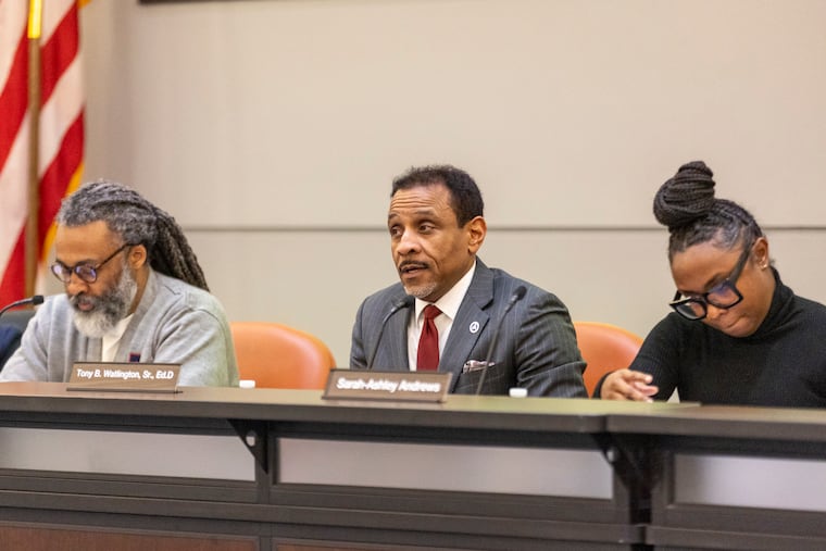 Superintendent Tony B. Watlington, center, speaks at the school board meeting in January.