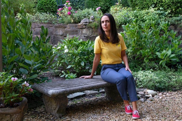 Juliana Macedo do Nascimento, 36, a Deferred Action for Childhood Arrivals program recipient who moved to the U.S. from Brazil when she was 14, poses for a portrait, Friday, Sept. 2, 2022, outside her apartment in Washington. Immigrants who signed up for an Obama-era program shielding them from deportation, long a symbol of youth, are increasingly easing into middle age.