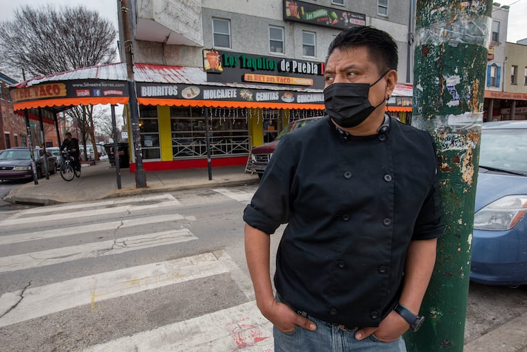 Ignacio Marcelo Flores, owner of Los Taquitos de Puebla at the corner of South Ninth and Federal Streets, is a member of the Association of Mexican Business Owners in Philadelphia.