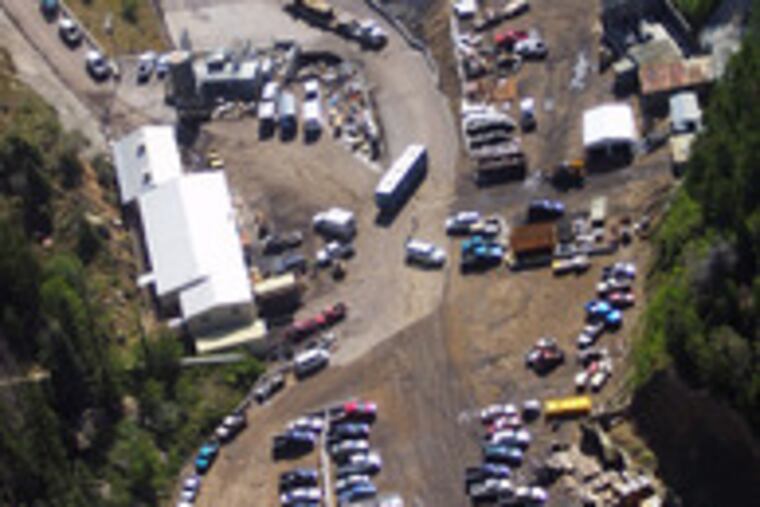 An aerial view of the mine in Huntington, Utah. “There is absolutely no way that .... we can reach the vicinity of the trapped miners for at least one week,” a mine executive said.