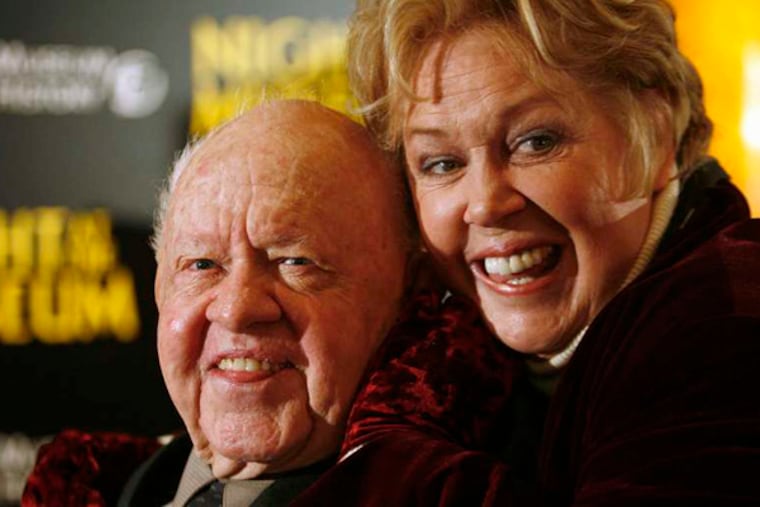 Actor Mickey Rooney (L) and his wife Janice arrive at the American Museum of Natural History for the premiere of the movie "Night at the Museum" in New York in this file photo taken December 17, 2006. The estranged wife of actor Mickey Rooney and his estate are locked in a legal tussle over the remains of the late Hollywood movie star, who left an estate of only $18,000, according to court documents. (REUTERS/Eric Thayer/Files)