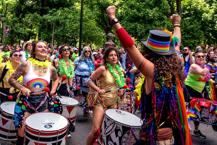 Drummers from Batala Philly, an all-percussion, community band that plays Samba Reggae music from Salvador, Bahia, and Brazil warms up the crowd before the march up Walnut Street as thousands of people celebrate queerness and the start of Pride Month at the Pride March and Festival in Center City Sunday, June 4, 2023.