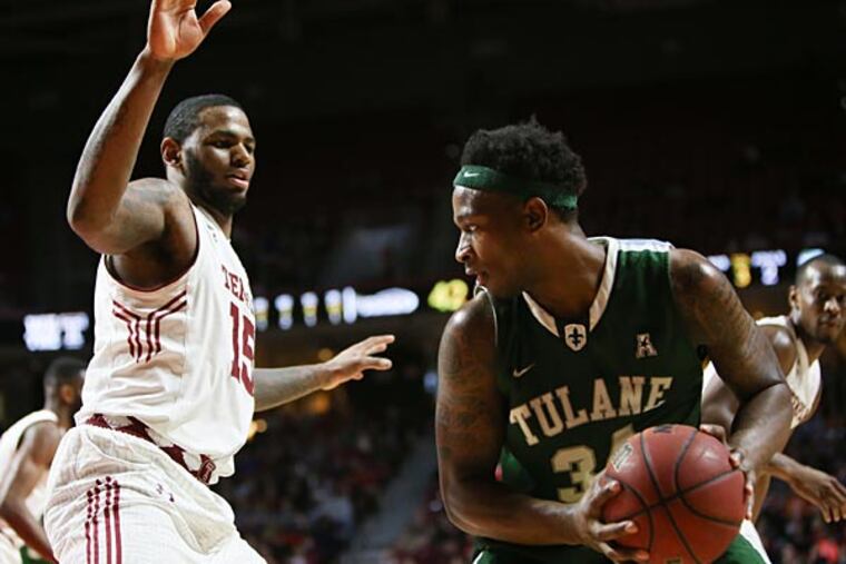 Temple forward Jaylen Bond defends Tulane forward Tre Drye. (Andrew Thayer/Staff Photographer)