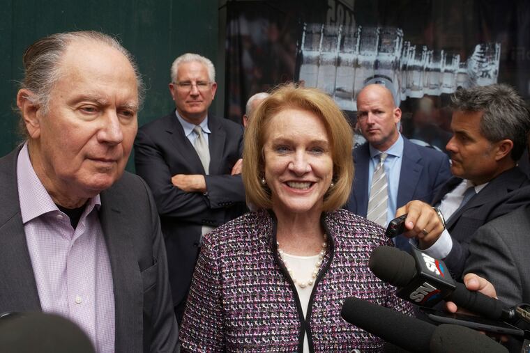 Seattle Hockey Partners David Bonderman (left) and and Seattle Mayor Jenny Durkan talk to the media as they leave an October meeting at the NHL headquarters in New York.