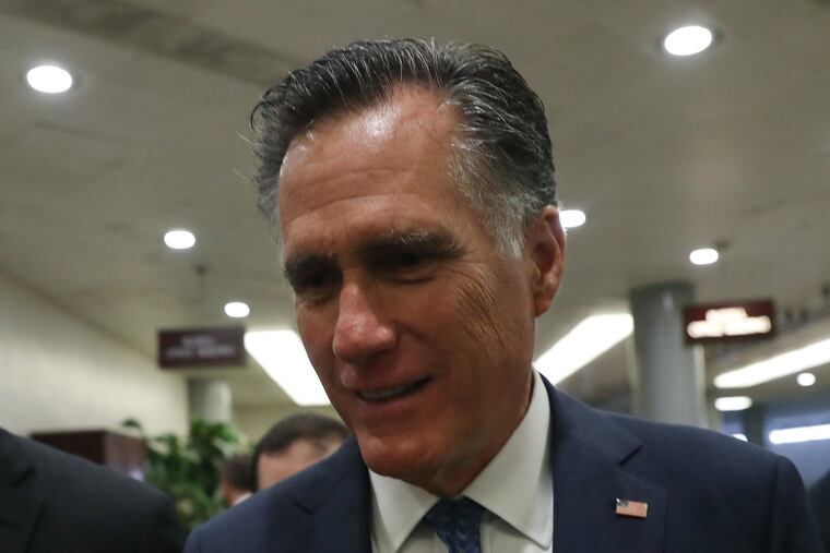 U.S. Sen. Mitt Romney (R-UT) walks past reporters on his way to a vote before attending the weekly Republican policy luncheon on Capitol Hill Sept. 24, 2019 in Washington, D.C.