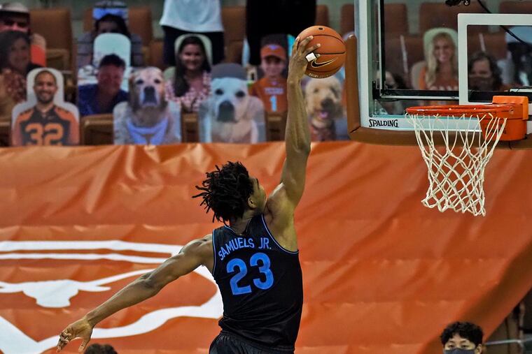 Villanova forward Jermaine Samuels goes up for a dunk during the second half.