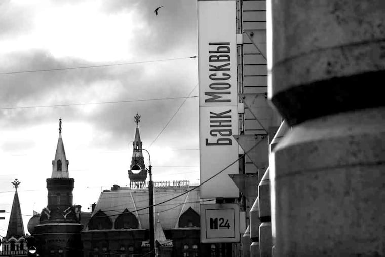 Bank of Moscow logo. In '98, Russia defaulted on the debts ex-Communist bosses amassed.