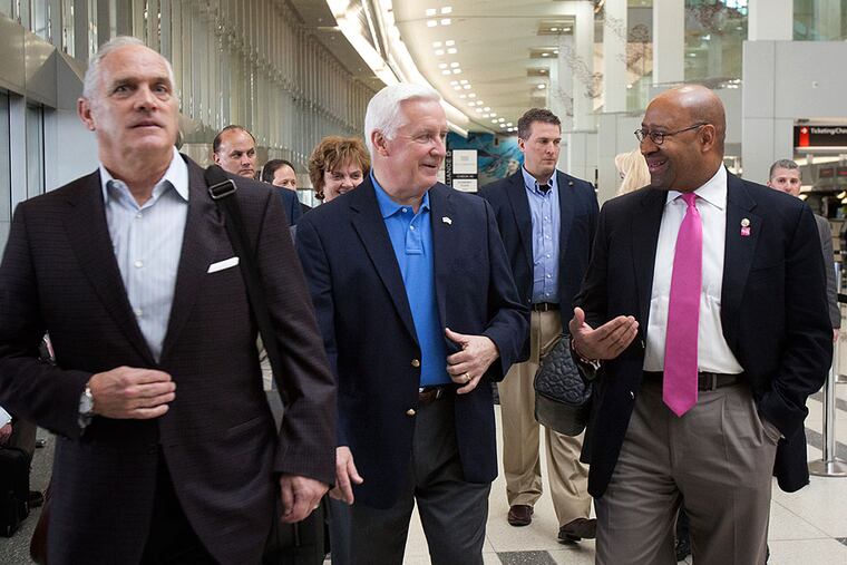 On the way to Rome: A delegation including (from left) Daniel J. Hilferty, president of Independence Blue Cross; Gov. Corbett; and Mayor Nutter, as well as Archbishop Charles J. Chaput, left Philadelphia on Sunday to help plan the 2015 World Meeting of Families and visit Pope Francis. ED HILLE / Staff Photographer