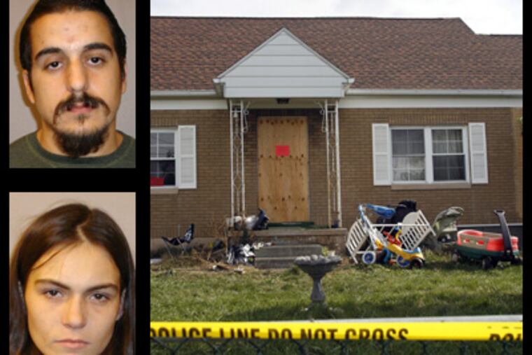 Police tape surrounds the Swatara Township home of Ryan and Debbie Donachy on Nov 3, 2007, a fatal fire killed two of their children, Britton, 2, and Onna, 18 months. The Donachys were charged in the aftermath. (House photo: Paul Chaplin / The Patriot-News)