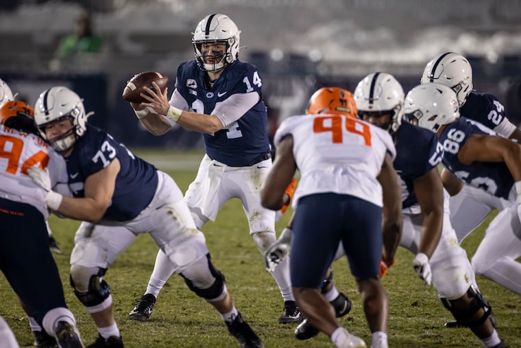 Penn State quarterback Sean Clifford (14), shown last December in a game against Illinois at Beaver Stadium, is the incumbent starter for the Nittany Lions as 2021 spring practice gets underway.