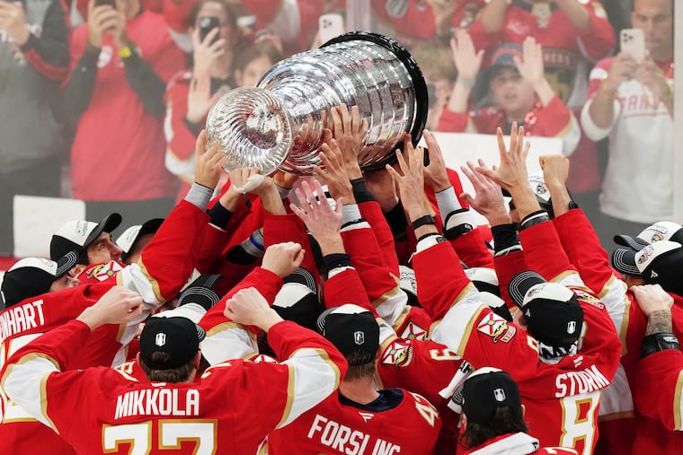 The Florida Panthers raise the Stanley Cup after defeating the Edmonton Oilers in Game 6 of the Stanley Cup Final.