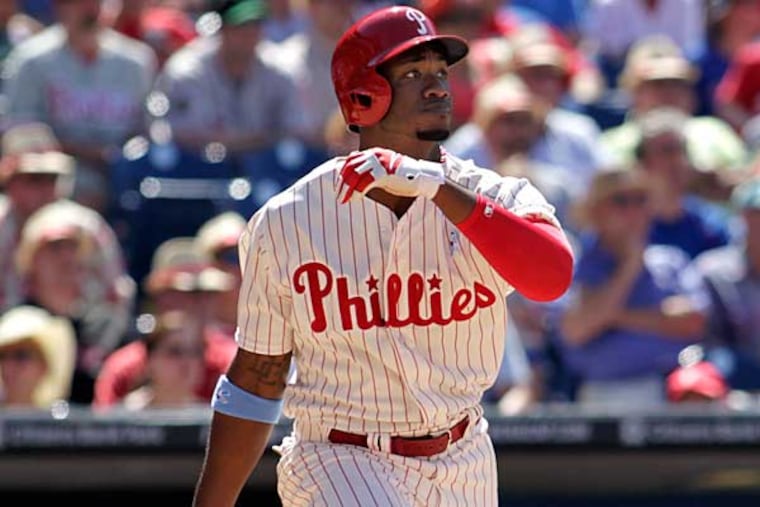 Domonic Brown in baseball action against the Chicago Cubs Sunday, June 15, 2014, in Philadelphia. (H. Rumph Jr/AP)
