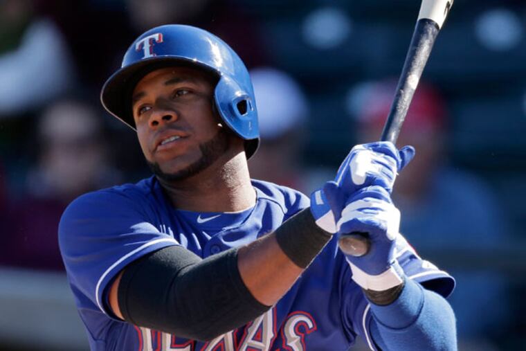 Texas Rangers' Elvis Andrus bats during an exhibition spring training baseball game against the Chicago White Sox Tuesday, Feb. 26, 2013, in Surprise, Ariz. (Charlie Riedel/AP)