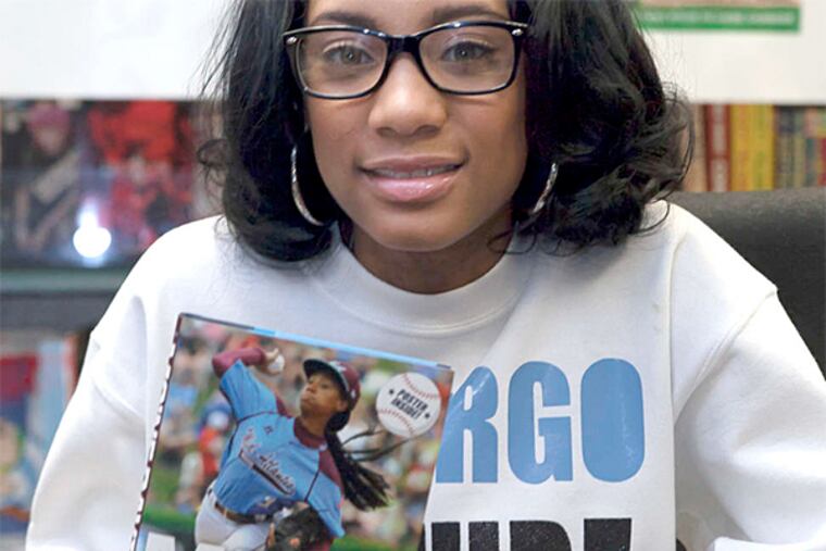Mo'ne Davis signed copies of "Remember My Name," Saturday. (Chanda Jones / Staff Photographer)