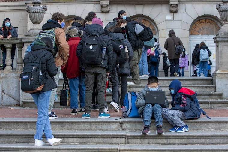 Students outside Masterman, at 17th and Spring Garden Streets, on Jan. 4, which is open for in-person learning.