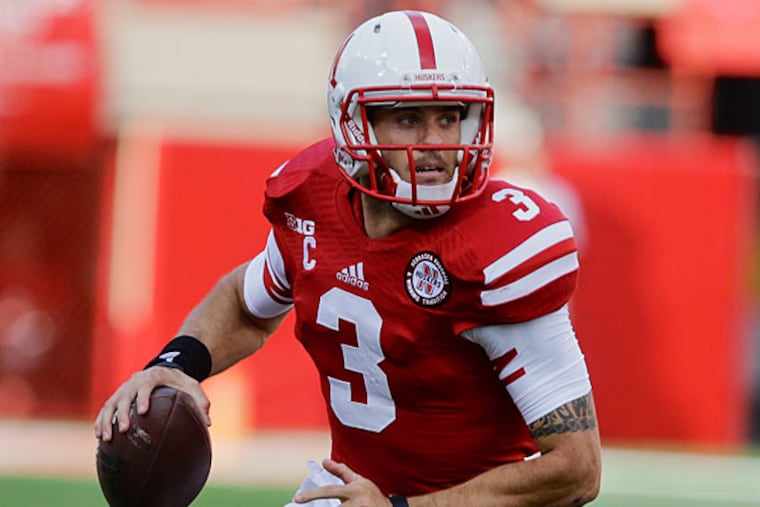 Taylor Martinez (3) runs with the ball in the first half of an NCAA college football game against Southern Mississippi in Lincoln, Neb., Saturday, Sept. 7, 2013. (Nati Harnik/AP file)