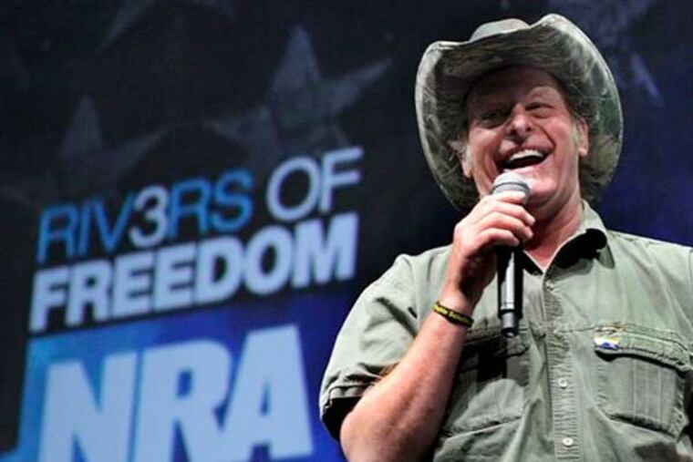 FILE - In this May 1, 2011 file photo, musician and gun rights activist Ted Nugent addresses a seminar at the National Rifle Association's convention in Pittsburgh. Rep. Steve Stockman , R-Texas, says he's invited Nugent, who has referred to President Barack Obama's administration as "evil, America-hating," to Tuesday's State of the Union address. (AP Photo/Gene J. Puskar, File)