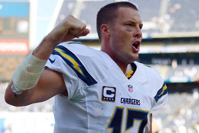 San Diego Chargers quarterback Philip Rivers (17) celebrates after the Chargers beat the Seattle Seahawks 30-21 at Qualcomm Stadium. (Jake Roth/USA Today)