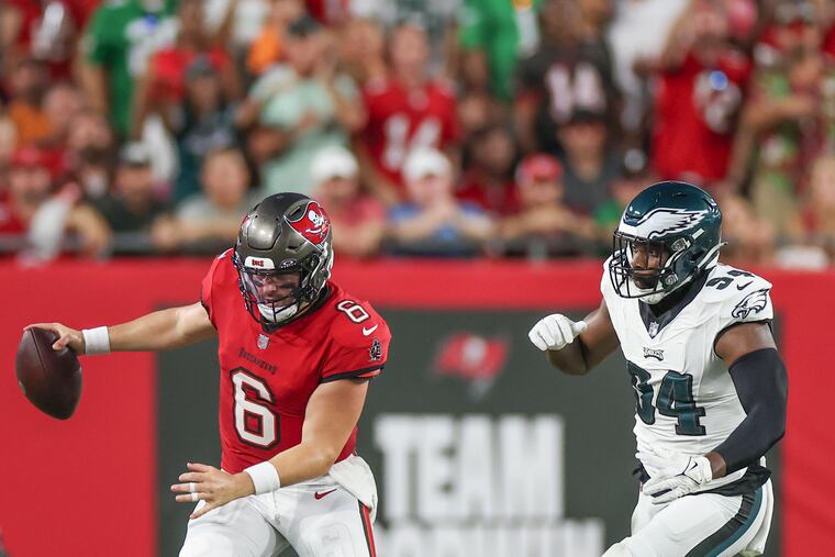 Defensive end Josh Sweat chases Tampa Bay quarterback Baker Mayfield out of bounds during the Eagles' Monday night victory.