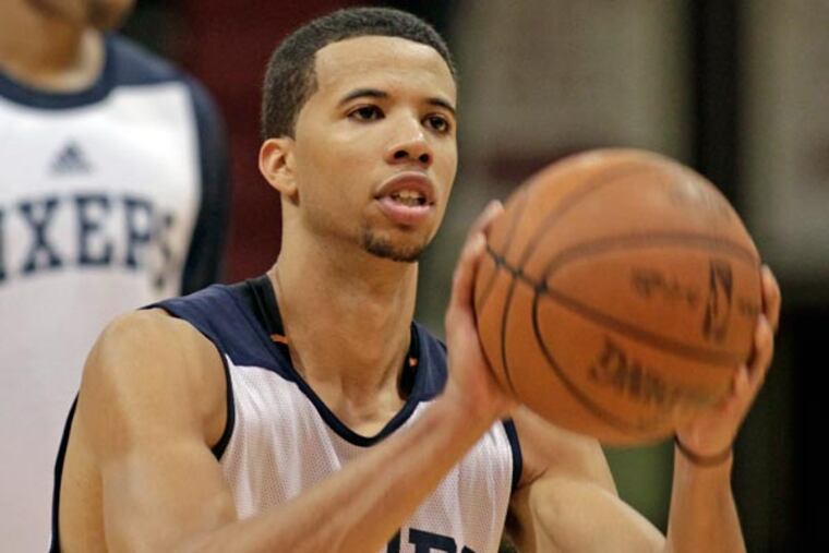 Michael Carter-Williams practices during NBA basketball training camp, Saturday, Sept. 28, 2013, in Philadelphia. (H. Rumph Jr/AP)