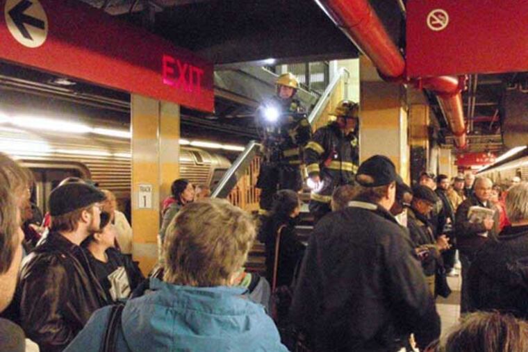 PATCO platform at 16th/Locust on Friday, March 21 as firefighters responded to smoke in the subway..Photo: Hoag Levins