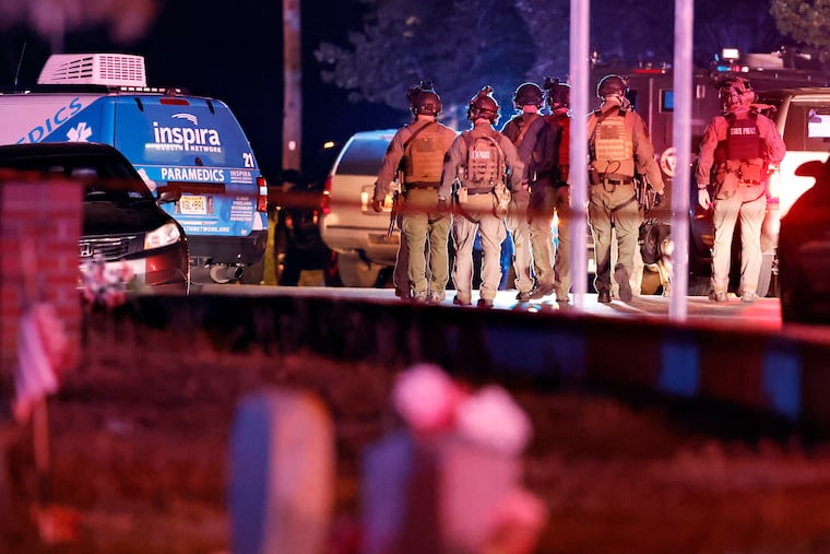 Members of the N.J. State Police F.A.S.T. Team at the scene of a multiple shooting at 1029 E. Commerce St. in Fairfield Twp., Cumberland County, N.J. shortly before midnight on May 22, 2021. Unconfirmed reports from the Breaking News Network were that 12 people had been shot with 4 of them being DOA and an active shooter was still on the scene.