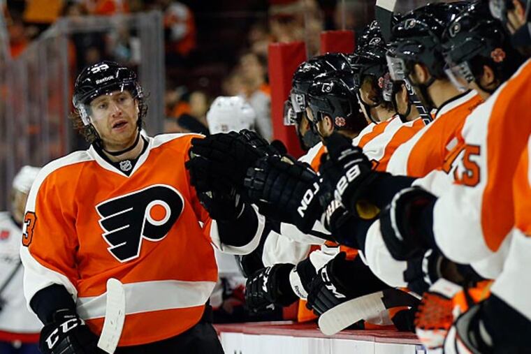 Jakub Voracek celebrates with his teammates against the Washington Capitals. (Yong Kim/Staff Photographer)
