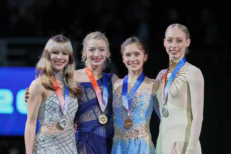 From left, silver medalist Alysa Liu, gold medalist Amber Glenn, bronze medalist Isabeau Levito and fourth-place finisher Bradie Tennell pose with their medals after the free skating competition at the U.S. Figure Skating Championships in St. Louis.