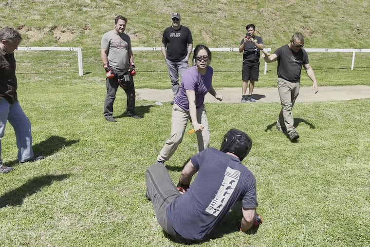 Annette S.L. Evans demonstrating self-defense at the Tactical Conference 2021 in Dallas.