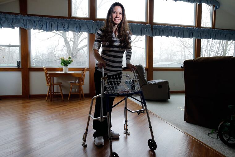 Theresa Gattuso O’Connor at her home in Mickleton, where she lives with her husband, Joe, and daughter, Samantha. She said she wanted “to show Samantha that limitations can be overcome.”