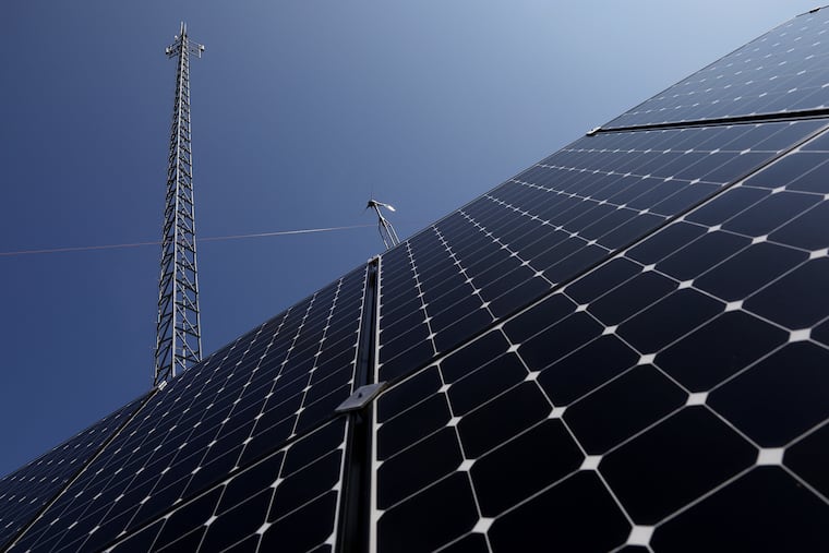 The Rural Broadband Cooperative's wireless internet tower (top left) is pictured alongside solar panels and a wind power generator in Mill Creek, Pa., on Tuesday, June 23, 2020. Local residents worked together to build and maintain the tower, which became operational in October 2019, because they were frustrated with slow internet service.