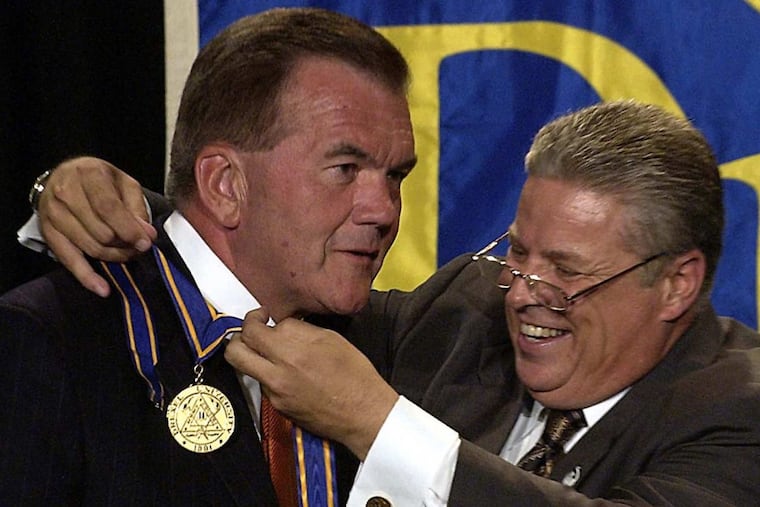 Drexel President Constantine Papadakis presenting the Drexel University President’s Medal to Tom Ridge, Secretary of Homeland Security.