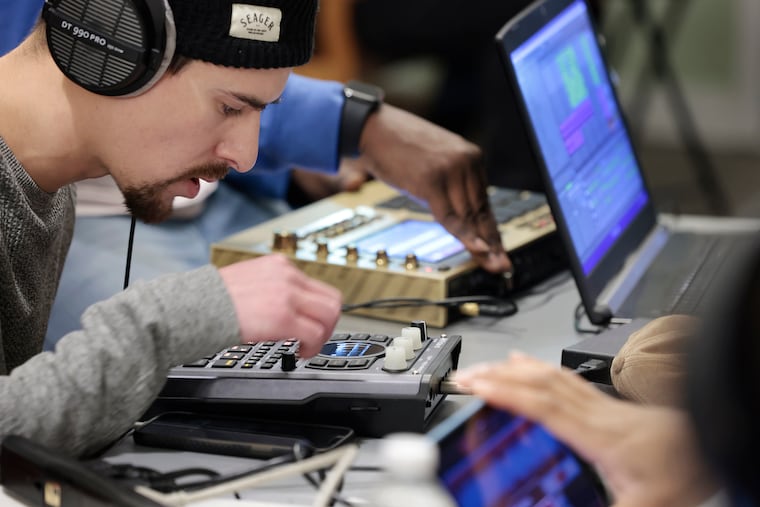 Jant Blur of Philadelphia works on his beat during a monthly Flipabeatclub event at Cratediggaz Records, 711 S 4th St., Phila., Pa. on Fri., Jan. 20, 2023.