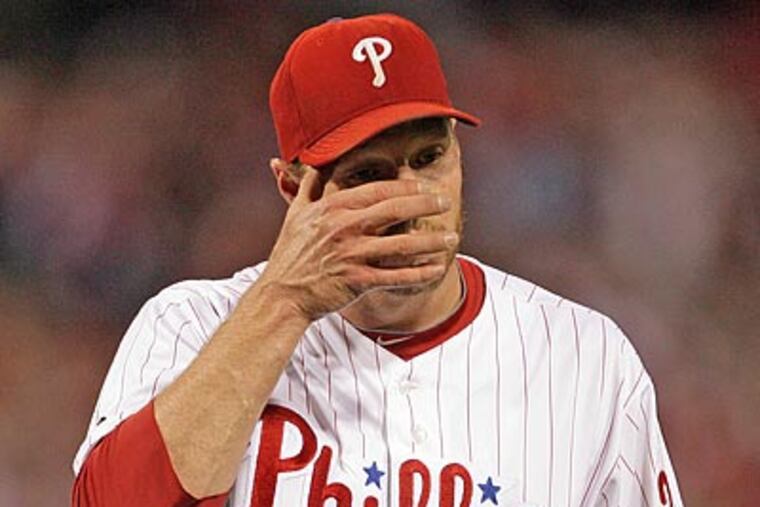 Roy Halladay allowed four runs in seven innings pitched. (Yong Kim/Staff Photographer)