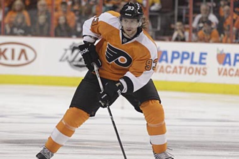 Jake Voracek sprained his right knee during a KHL game and is expected to miss four weeks. (Matt Slocum/AP file photo)