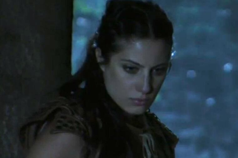 Lina Carollo of Delran spies from a perch in a tree during the seventh episode of ABC's "The Quest," a competition show set in a fantasy world.