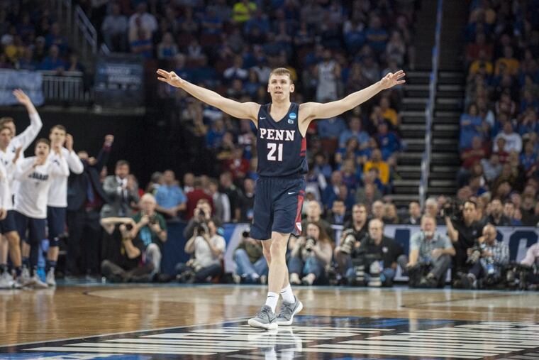 Penn Quakers guard Ryan Betley (21) celebrates after a play against the Kansas Jayhawks during the First Round of the 2018 NCAA Men's Basketball Tournament Thursday, March 15, 2018 at Intrust Bank Arena in Wichita, Kan.
