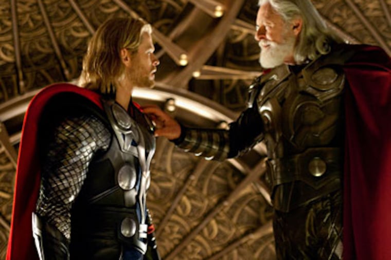 Chris Hemsworth, left, and Anthony Hopkins are shown in a scene from the film, "Thor." (AP Photo / Paramount Pictures-Marvel Studios, Zade Rosenthal)